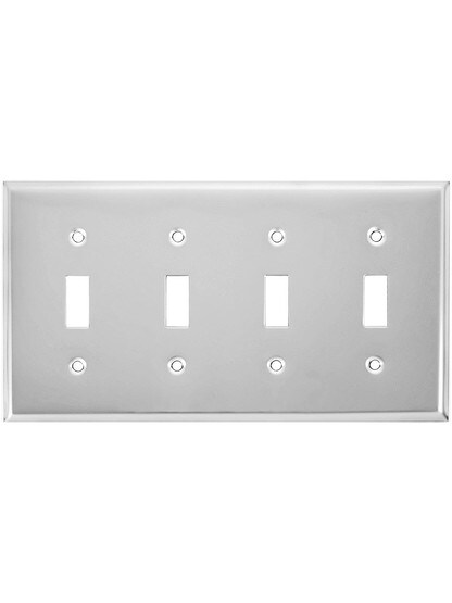Classic Four Gang Toggle Switch Plate In Polished Chrome.